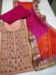 ATHARVA Hand Embroidered Salwar Kameez in Pink w/Neck | Etsy Pink Chanderi Churidar For Transitional Season, Transitional Pink Salwar Kameez With Gota Work, Multicolor Gota Work Kurta For Transitional Season, Straight Kurta With Gota Work In Chinon, Navratri Kurta With Gota Work, Chinon Straight Kurta With Gota Work, Bollywood Style Churidar With Gota Work For Navratri, Pink Bollywood Style Churidar For Transitional Season, Multicolor Anarkali Kurta With Gota Work