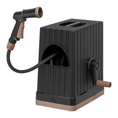 a black and brown heater with a hose attached to the back of it's holder