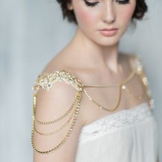 "Two beautiful epaulettes of venice lace just wrap perfectly around the shoulder and are hand beaded with Preciosa crystals. Draped down the shoulders are beautiful Preciosa crystal chain loops. Simple beautiful chain drapes down the front of this necklace with a small crystal tear drop. The back is where the drama lies on this piece where 3 tiered cascading crystal chains drape down from each beaded piece of lace. Dripping from each chain is a beautiful handset crystal. Gorgeous! The Fine Detai Delicate Gold Body Jewelry For Wedding, Statement Necklace Wedding, Bridal Capelet, Shoulder Bones, Shoulder Jewelry, Silver Statement Necklace, Shoulder Necklace, Chain Loop, Silver Necklace Statement