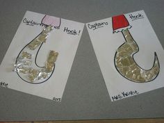 two pieces of paper that have been made to look like horseshoes