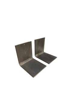 two metal shelves sitting side by side against a white background with no one in the photo