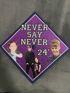 a purple graduation cap with pictures of people on it that says never say never 24