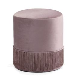 a small round ottoman with fringe trim on the top and bottom, in light pink