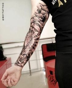 a person with a tattoo on their arm