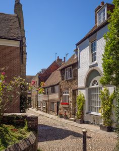 a cobblestone street in an old european village