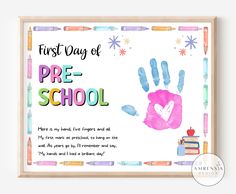 the first day of pre - school handprint is displayed in front of a frame