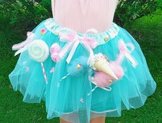 Pretty Candyland/Sweets Themed Tutu Skirt for Both Ladies and Kids! 😍.    You'll find a little bit of everything on this cutie! 🍦 Choose a skirt color. Either mint green as shown or light pink.  🍦 This is a three-layer skirt and will  measure about mid thigh.  🍦 It is decorated with:  * An upside down vanilla ice cream with sprinkles leaning against a pink cotton candy.  * A  swirl Lollipop, a light blue cotton candy, two pink ice cream scoops with sprinkles, pink ruffled bows,  * Sweet char Cute Spring Tutu Dress For Costume Party, Playful Spring Tutu Dress For Costume Party, Playful Tutu Dress For Spring Costume Party, Sweet Party Skirt, Tutus For Women, Ice Cream Outfit, Ice Cream With Sprinkles, Swirl Lollipop, Tutu Women