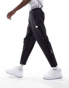 Pants & Chinos by The North Face Can't go wrong in sweats Elasticized waistband Functional pockets Logo print details Regular fit Black Activewear With Ribbed Waistband And Tapered Leg, Black Activewear With Comfort Waistband And Tapered Leg, Black Tapered Leg Activewear With Ribbed Waistband, Black Tapered Leg Activewear With Comfort Waistband, Black Tapered Leg Sweatpants In Athleisure Style, Black Tapered Leg Athleisure Sweatpants, Black Tapered Leg Activewear For Jogging, Urban Style Sports Joggers With Hip Pockets, Urban Black Activewear With Pockets