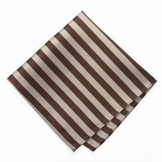 Alternating ribbed and satin stripes add to the charm of this brown and beige striped pocket square. It's one of our top picks for groomsmen attire, but it's quite dapper for everyday attire, too. Measures a large 12-inches square. Looks great with a solid tie, but matching neckties and bow ties are available, too. Product Features • Measures approximately 12" by 12" • Finished edges • Stripes measure approximately 0.375" • Colors are brown and beige• Made from 100% Polyester Microfiber • Altern Elegant Brown Suit And Tie Accessories With Pocket Square, Brown Suit And Tie Accessories With Pocket Square, Elegant Brown Pocket Square For Business, Classic Brown Pocket Square For Formal Occasions, Daytime Wedding, Navy Blue Suit, Brown And Beige, Groomsmen Attire, Blue Suit