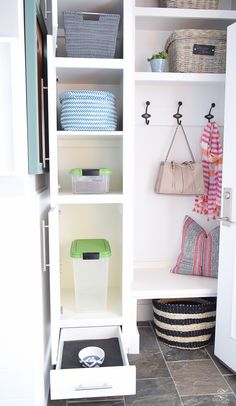 an organized closet with baskets and other items