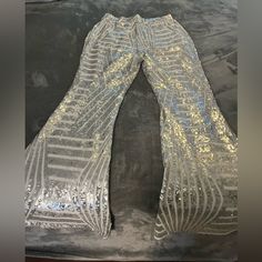 Brand New, Never Worn Gorgeous Sequin Pants With White Lining On Inside. Unique Pattern. Waist Is Stretch Band And The Pants Have Stretch To Them As Well. Length Is 44” And Waist (Unstretched) Is 14” Hip Is 20”. Size Is Large. Spring Festival Sequin Bottoms, Fitted Flare Bottoms For Party Season, Flare Fitted Bottoms For Party Season, Fitted Festival Trousers, Festival Fitted Trousers, Fitted Trousers For Festival, Fitted Trousers For Festivals, Stretch Full Length Bottoms For Party Season, Stretch Full Length Bottoms For Party