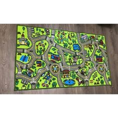 a child's play mat on the floor with cars and trucks painted on it