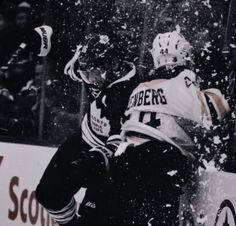 an image of a hockey game being played in the snow with confetti thrown on him