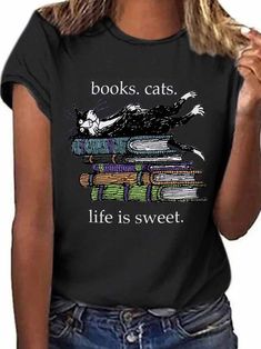 Cat & Book Graphic Tee Literary Style Short Sleeve Screen Print Tops, Graphic Print Crew Neck T-shirt For Reading, Screen Print Short Sleeve Tops, Literary Black Cotton T-shirt, Black Literary Crew Neck T-shirt, Black Bookish T-shirt With Screen Print, Bookish Style Letter Print Summer Tops, Summer Bookish Tops With Letter Print, Black Literary Top With Graphic Print