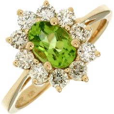 Royal 14K Yellow Gold Oval Peridot Ring with Diamond Halo - 0.85 Carat Peridot & 0.75 Carat Total Diamond Weight. Luxury Green Peridot Diamond Ring, Luxury Gold Rings With Peridot, Peridot Color, Timeless Ring, Diamond Birthstone, Yellow Gold Jewelry, Ring With Diamond, Peridot Ring, Diamond Charm