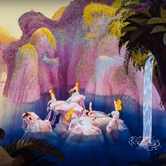 the princess and the frog are riding on horses in front of a waterfall, surrounded by other animals