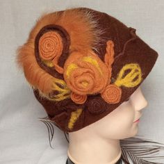 Women like to feel comfortable and look beautiful in any weather, if so, then I suggest taking a women's felted beret with decor. The beret is made of brown lambswool. The beret is decorated with felt, wool and natural fur. The beret is suitable for the classic and bohemian style of clothing. The beret will warm the head and ears in the cold season. The beret will favorably emphasize your eyes and give your image originality. The beret will be a good gift for your beloved woman for her birthday, Brown Wool Cloche Hat For Winter, Brown Wool Beret For Fall, Vintage Brown Beret For Winter, Brown Vintage Winter Beret, Brown Cloche Hat One Size For Winter, Brown Winter Cloche Hat One Size, Brown Winter Cloche Hat, One Size, Winter Brown Cloche Hat One Size, Brown Winter Cloche Hat