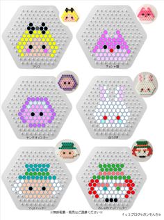 the cross stitch pattern is designed to look like hexagons with faces on them