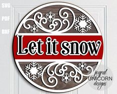 a red and white sign that says let it snow on the front of a door