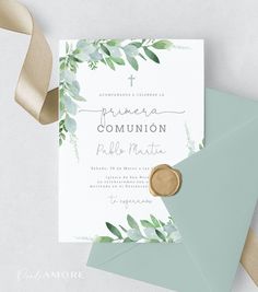 a wedding card with a wax stamp on it and a ribbon around the envelope that says,