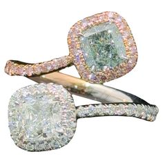 three different colored diamond rings on top of each other