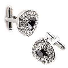 Sparkly designs that pique interest in the right way! This cufflink set is a must-have. With a gleaming color filled centerpiece surrounded by shiny crystals, each cufflink catches your attention immediately. Every facet of the crystals dazzles radiantly when light falls on them, making it hard to miss this elegant accessory for that special occasion. Specifications Metal Type: Zinc Alloy Shape\pattern: Triangle Stone Colors: Black/White/Purple Material: Metal Model Number: B1121 Metal Finish: S Classic Cuff Jewelry For Party, Classic Jewelry With Bling For Formal Occasions, Classic Formal Jewelry With Bling, Modern Formal Jewelry With Bling, Classic Bling Jewelry For Formal Occasions, Formal Diamond White Jewelry With Black Diamonds, Shiny Crystals, Pattern Triangle, Cufflink Set