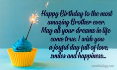 a cupcake with blue frosting and a sparkler on top is featured in this happy birthday card