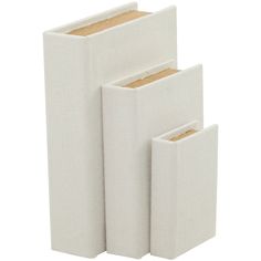 three pieces of white linen are stacked on top of each other