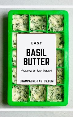 an ice tray filled with assorted pieces of food next to a sign that says easy basil butter freeze it for later