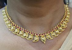 22 Karat Gold 'Mango' Necklace with Red Stones - 235-GN3045 - in 26.900 Grams for USD $2119.79. 
Made in India by Totaram Jewelers Online this product is in Gold - 22 Karat BIS Hallmark 916 KDM Gold  & is an excellent gift for Adult - Women. Ships fully insured with secured guaranteed delivery for free with your order over $250 from New Jersey USA & comes with 30 days exchange policy. Red 22k Gold Temple Jewelry Necklace, Red 22k Gold Temple Necklace For Celebration, Red 22k Gold Necklace For Celebration, Red 22k Gold Round Necklace, Gold Temple Necklace With Ruby, Gold Temple Necklace With Round Ruby, Gold Ruby Temple Necklace, Mango Necklace, Mango Mala