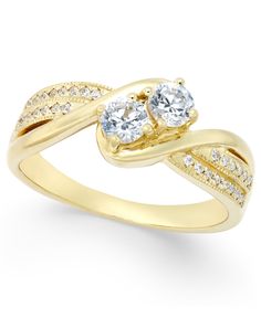 two stone ring in yellow gold with diamonds