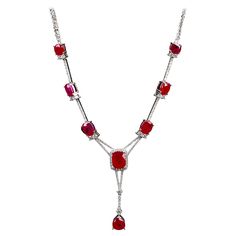 An entry level Ruby and Diamond Necklace in 18K White Gold. This is the prefect entry level ruby Necklace as it is not too grand but at the same time it is well designed and looks expensive. You have 3 smaller ruby on one side of the necklace and a bigger one at the middle. On top of that, dripping of the smaller ruby away from the main stone making the whole necklace longer and differentiate it from a choker to a full length Necklace. If you are interested in this entry level full length necklace design please feel free to send us a message to discuss further. The necklace consist of a total of 9 pieces unheated Intense Red Ruby Total Ruby weighs 13.76 ct Total Natural diamond weight is 1.674 ct , The Colour of the Diamond is Approximately E/F with VS Clarity Ruby Diamond Necklace, Ruby And Diamond Necklace, White Diamond Necklace, Velvet Choker Necklaces, Diamond Tennis Necklace, Modern Bracelets, Gold For Sale, Pearl And Diamond Earrings, Length Necklace