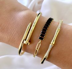 Choice of Gold Filled Bracelets - Nail Bangle Bracelet - Bamboo Micro Pave Cuff - Black Onyx Tennis Bracelet with Paperclip Chain - Bracelet Stacks Half Bangle Half Chain Bracelet, Black And Gold Bracelet Stack, Nail Bangle, Gold Bracelets Stacked, Black Bangle, Bracelet Stacks, Nail Bracelet, Jewelry Magazine, Ribbon Bracelets