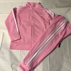 Authentic Adidas Girl Athletic 2 Piece Tracksuit % Authentic % Brand New With Tags % Polyester Color: Light Pink With White Lines ####Notice Jacket Is Size 6 And Pants Are Size 4### Smoke Free Home Go Ahead Make Me An Offer Nwt Nwt Nwt Nwt Nwt Nwt Nwt Nwt Adidas Fitted Long Sleeve Sets, Adidas Fitted Winter Sets, Winter Adidas Fitted Sets, Fitted White Adidas Sets, Adidas White Long Sleeve Set, Adidas Pink Fitted Sets, Fitted Pink Adidas Sets, Adidas Pink Sets For Spring, Pink Adidas Cotton Set