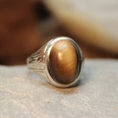 1940's Vintage Mans Tigers Eye Sold Gold 10K Ring 7.1 Grams Size 9 Solid Gold Man Ring Vintage Mans Gold Cats Eye Ring Man Vintage Rings - Etsy Classic Untreated White Gold Rings, Vintage Brown Ring With Polished Finish, Vintage Sterling Silver Rings Stamped 14k, Vintage Oval Moonstone Ring With Polished Finish, Classic Collectible Rings With Polished Finish, Classic Brown Signet Ring For Anniversary, Classic 14k Gold Brown Ring, Classic Brown Rings With Polished Finish, Classic Oval Brown Ring