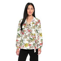 This blouse from Guillaume is effortlessly playful with it's multi color floral print and fresh details. It's made of lightweight woven fabric with a slight crepe texture. Ruffles decorate the surplice neckline as it wraps around and ties on your left side. Long cuffed sleeves add a flowy finishing touch on this supremely stylish top! Versatile Floral Print V-neck Tops, Spring Tie Waist Tie Neck Top, Versatile V-neck Top With Floral Print, Spring Tops With Tie Waist And Tie Neck, Versatile V-neck Tops With Floral Print, Versatile Blouse With Tie Waist For Spring, Spring Floral Print Tie Neck Tops, Versatile Floral Print Spring Tops, Versatile V-neck Blouse With Floral Print