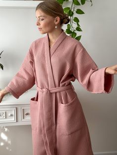 "Waffle Hand Made Kimono style Bathrobe Wrap yourself into the softest waffle robe, ever. Comfortable, high-quality, cosy, and sustainable. Perfect as a gift for any occasion. Made from 100% pure organic Netherlandish cotton. Oeko-Tex Standard 100 Certified ® Enjoy the spa feeling at home! * Soft and comfortable * Absorbent and quick drying * Lightweight and breathable * Durable * Hypoallergenic * 100% cotton waffle  * Easy garment care SIZING Bathrobes are designed for a loose fit: S/M:  - total length (center back length) - 115 cm/45\"; - bust - 60 cm/23.6\"; L/XL:  - total length (center back length) - 115 cm/45\"; - bust - 66 cm/26\"; Models wearing size S/M Girl height 5'61 /168cm C O L O R S: We have a wide selection of colors: https://www.etsy.com/shop/KajStore?ref=seller-platform-m Feminine Long Sleeve Kimono For Loungewear, Feminine Long Sleeve Robe For Home, Feminine Long Sleeve Home Robe, Pink Wrap Kimono For Loungewear, Spa At Home, Cotton Bathrobe, Environmental Consciousness, Mode Kimono, The Spa