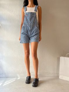 - Vintage Ikeda plaid denim overall shorts - 100% cotton - Made in Canada - Tagged S Waist: 15" Rise: 21" Inseam: 4.5" We are not responsible for lost, stolen, or damaged packages once they have been shipped. Any additional customs duties or taxes incurred on international orders are the responsibility of the buyer. Please note that our items are vintage and may have minor flaws or imperfections due to their age, which adds to their unique character. Womens Overalls, Denim Overall Shorts, Overalls Shorts, Denim Overalls Shorts, Jeans Overall, Overalls Women, Denim Overalls, Overall Shorts, Halloween Shopping