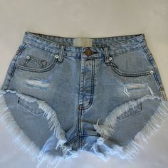 Light Wash Summer Cutoff Jean Shorts With Pockets, Light Wash Jean Shorts With Pockets For Summer, Summer Light Wash Jean Shorts With Pockets, Summer Cutoff Denim Blue Shorts, Summer Denim Jean Shorts With Frayed Hem, One Teaspoon Shorts, Jean Shorts, Denim Shorts, Blue And White