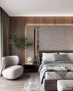 a large bed sitting next to a white chair in a room with wooden walls and flooring