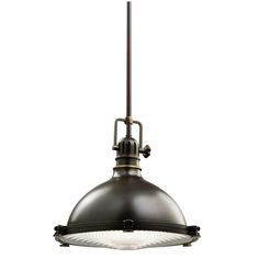 an industrial style pendant light hanging from the ceiling