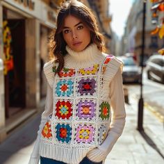 - Each vest is hand-crocheted with care, featuring vibrant granny squares in colors like red, blue, green, and yellow - A stylish boho-chic addition to any outfit, this vest pairs well with both casual and dressy looks - Tailor-made options are available to meet your personal size and color preferences - Your satisfaction is important; expect the finished product to match the provided image with a 95% accuracy rate SIZES and MEASUREMENTS - If you are unsure, please choose your regular size and g Vest Patchwork, Granny Square Vest, Vest Handmade, Multicolor Crochet, Handmade Vest, Patchwork Vest, Boho Vest, Crochet Vest, Vest Outfits