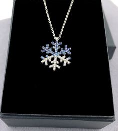 "Dainty CZ Silver Snowflake Necklace, Snowflake Pendant *An exclusive gift jewelry for you and your loved one. This snowflake necklace will be a GREAT choice for you. And they will be an ideal gift for your girlfriend, wife, fiancee, daughter, mother, your special someone in winter, especially for Christmas and Valentines. * Elegant Design: Beautifully aligned Snowflake-shaped with clear zircon sparkly stone * Material: High-Quality Real Solid 925 Sterling Silver (92.5% silver) Nickel-free, Lead Sterling Silver Snowflake Jewelry For Anniversary, Sterling Silver Snowflake Jewelry For Winter, Christmas Gift Cubic Zirconia Necklace, Cubic Zirconia Necklace For Christmas, Sterling Silver Snowflake Jewelry, Sterling Silver Snowflake Necklace In White Gold, Snowflake White Gold Jewelry Gift, White Gold Snowflake Jewelry Gift, White Gold Snowflake Necklace In Sterling Silver