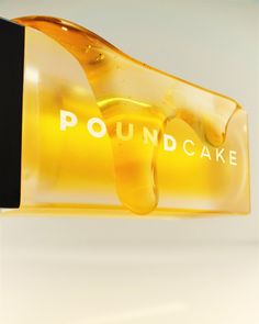 a bottle of pound cake sitting on top of a table