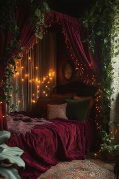 a bed covered in lots of lights next to a window with red curtains and pillows