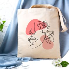 This 100% cotton bag comes in one size - 15" x 16"- perfect for everyday wear. While the canvas material will show off your designs in great colors, it's durable and will last for years. The bag features 20" handles (made from the same canvas), making it easy to carry even with a week's worth of shopping. .: 100% cotton canvas .: Available in natural color .: Heavy fabric (12 oz/yd² (406.9 g/m .: Sewn-in label Artistic Canvas Shopping Bag, Artsy Cotton Canvas Bag For Gift, Artsy Cotton Canvas Bag For Everyday, Artsy Cotton Canvas Bag As Gift, Artsy Cotton Canvas Bag Gift, Artistic Cotton Canvas Gift Bag, Artsy Cotton Tote Bag, Artistic Cotton Shoulder Bag For Gifts, Artistic Cotton Shoulder Bag - Gift