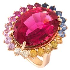 13.15 Carat Pink Tourmaline (Rubellite) surrounded by colored Sapphire on Pink Gold 18K Ring. Dimensions: approx. 2.60 centimeters x 2.20 centimeters. Total weight: 14.09 grams. Ring Size: 53 / 6.5 US. Ring Rosegold, Pink Tourmaline, Pink Gold, Or Rose, Pink And Gold, Fashion Rings, Tourmaline, Jewelry Rings, Sapphire