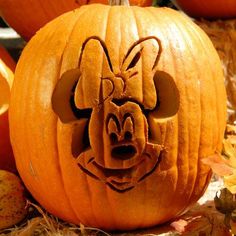 a pumpkin carved to look like mickey mouse