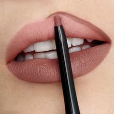 Trendsetter is a mocha brown lip liner. Part of Runway Rogue's Designer Liner collection, this lip pencil is designed to line and shape your lips for the perfectly enhanced lip contour! Creamy glide on texture with intense color payoff while being smudge and water-resistant.