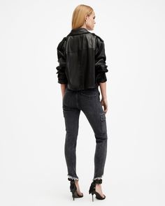 Mix up your rotation in the Duran Jeans. Cut from stretch denim with raw asymmetric shaped hems. They're mid-rise and skinny to flatter the leg. The stretch fabric is super comfy and features four pockets. Tuck in a tee and you're good to go in this iconic jean style.  These jeans are designed to a skinny fit Mid-rise Button closure with zip fly Raw asymmetric hems Cargo patch pocket Stretch denim Classic five pocket styling Reinforced pockets Horizontal darts and seam detail Edgy Frayed Hem Jeans For Fall, Urban Fitted Jeans With Frayed Hem, Urban Jeans With Frayed Hem For Fall, Trendy Jeans With Frayed Hem For Workwear, Trendy Frayed Hem Jeans For Work, Fitted Allsaints Bottoms For Spring, Allsaints Casual Bottoms For Fall, Allsaints Casual Fall Bottoms, Allsaints Casual Fitted Bottoms